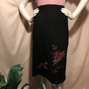 the limited “floral embroidered skirt”
 size XS
